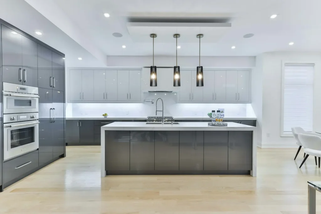 Renovated modern kitchen with island and pendant lights