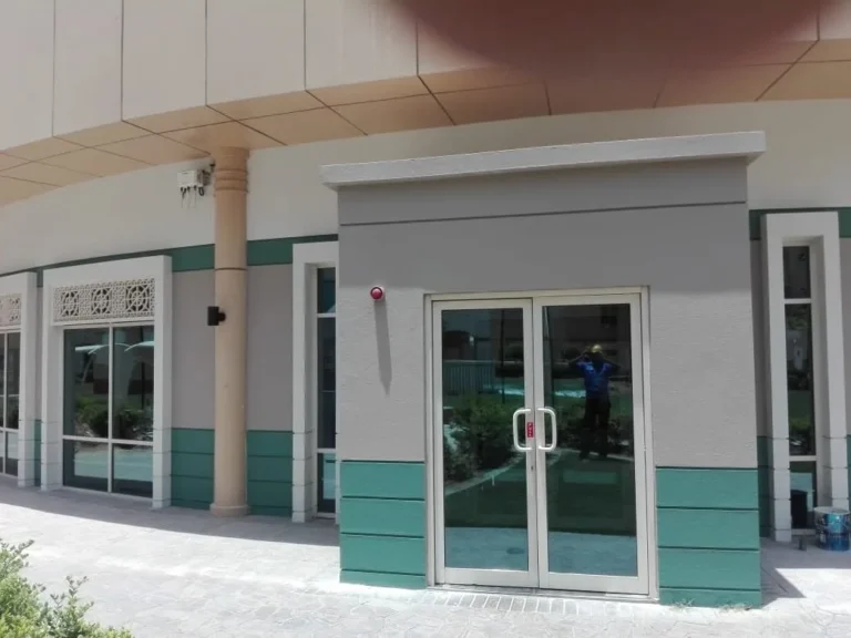 Freshly painted shopfront exterior with glass doors